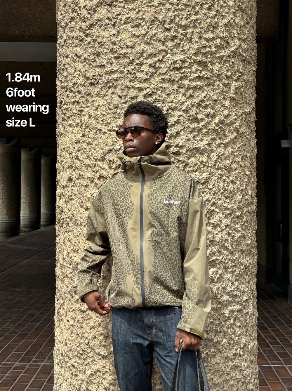 Green cheetah rain jacket feature