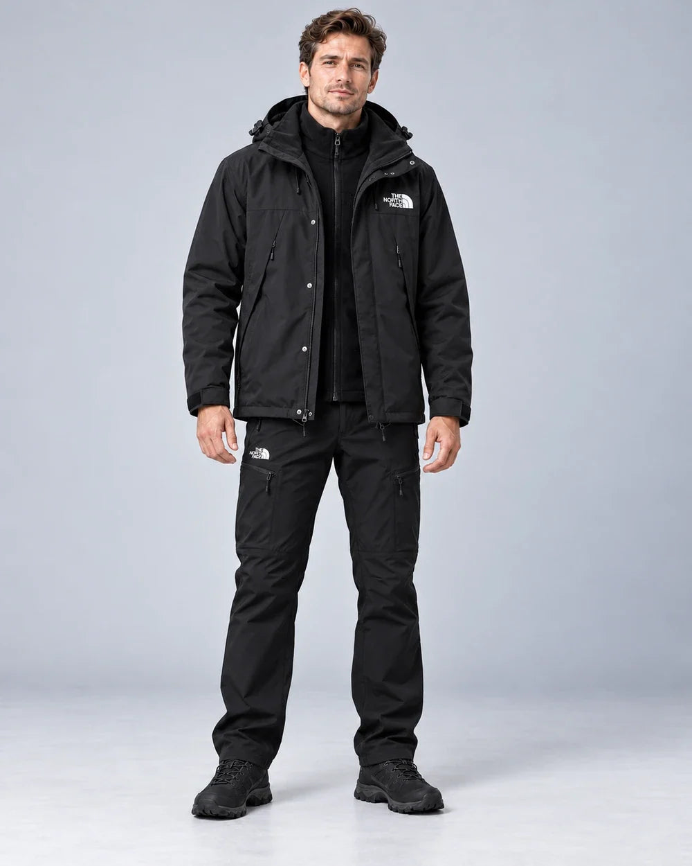 Black three-piece outdoor set shown worn together